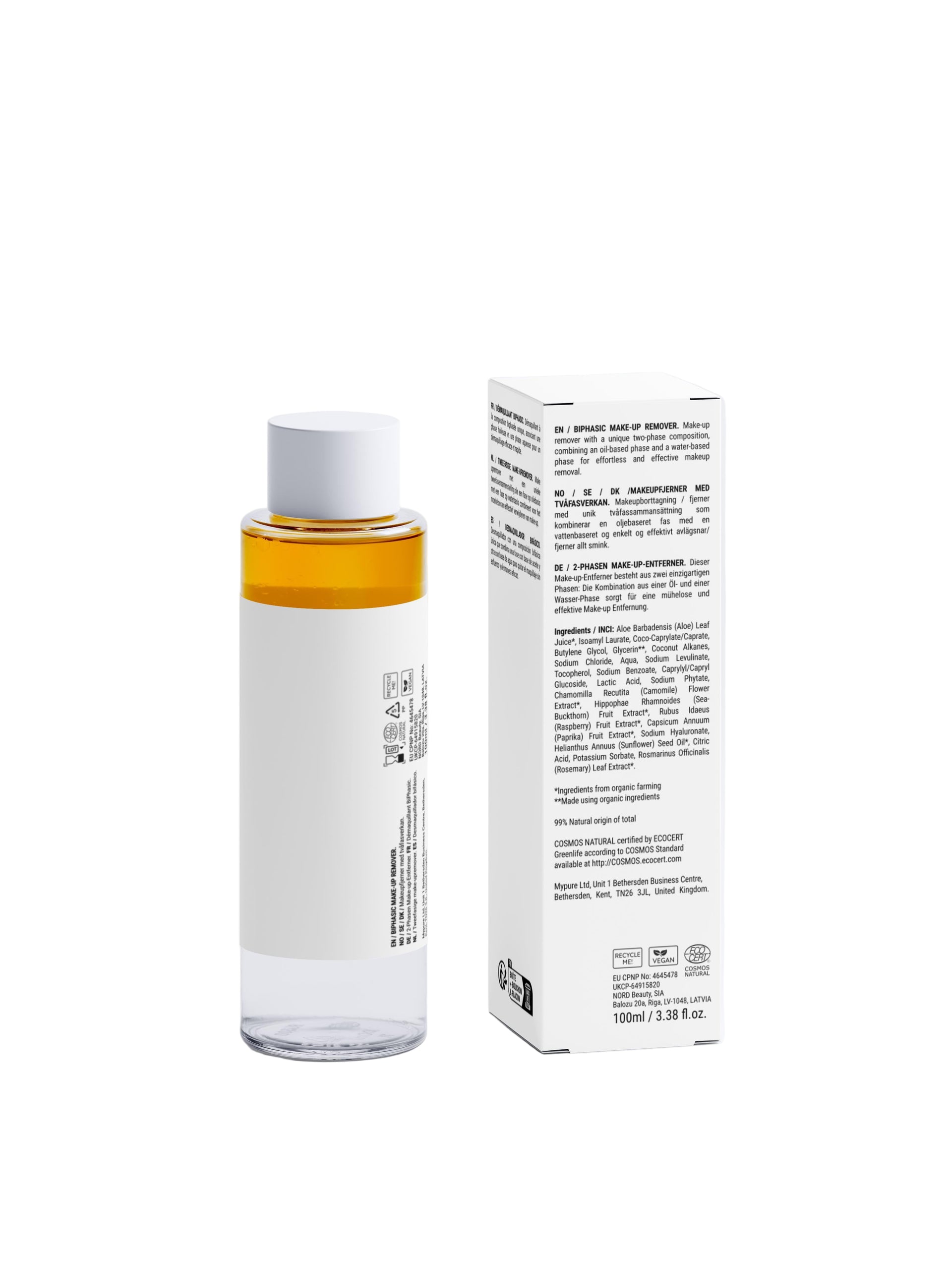 Skincare bottle with white cap and orange liquid next to its packaging on a light gray background