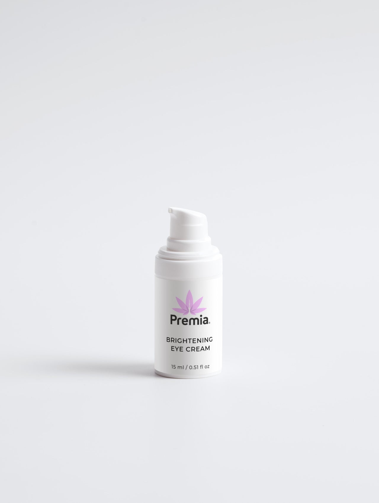 White eye cream bottle labeled 'Premia' on a white background